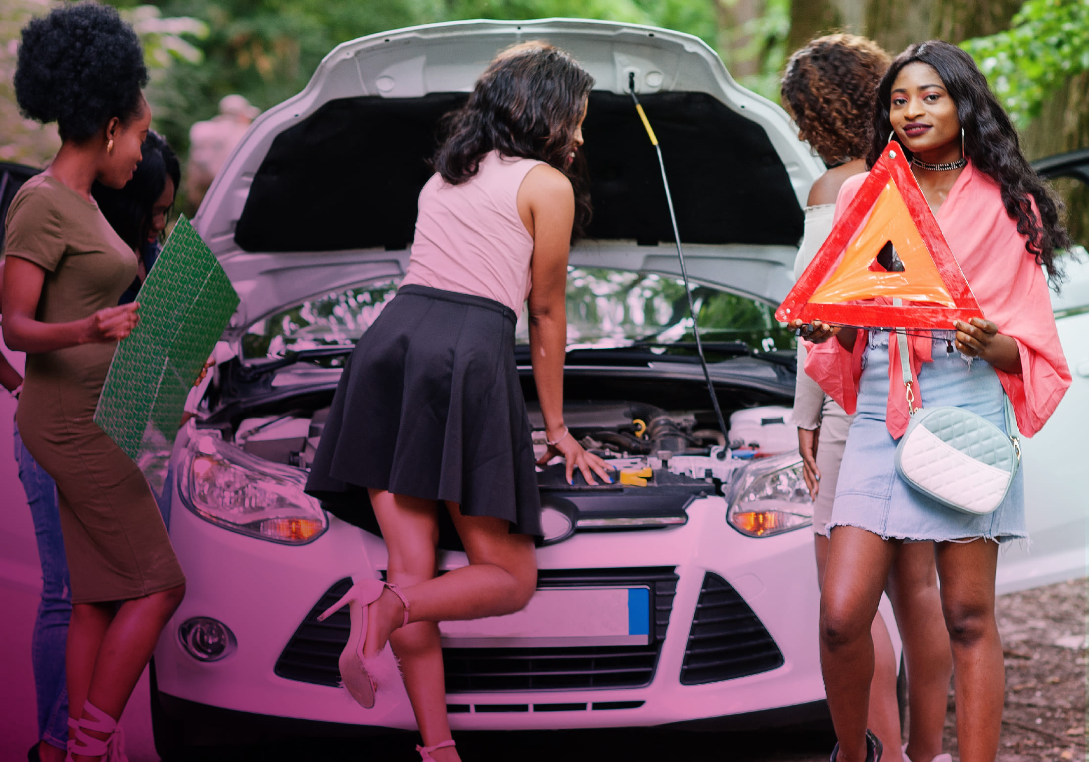 Woman calling for Old Mutual roadside assistance. 